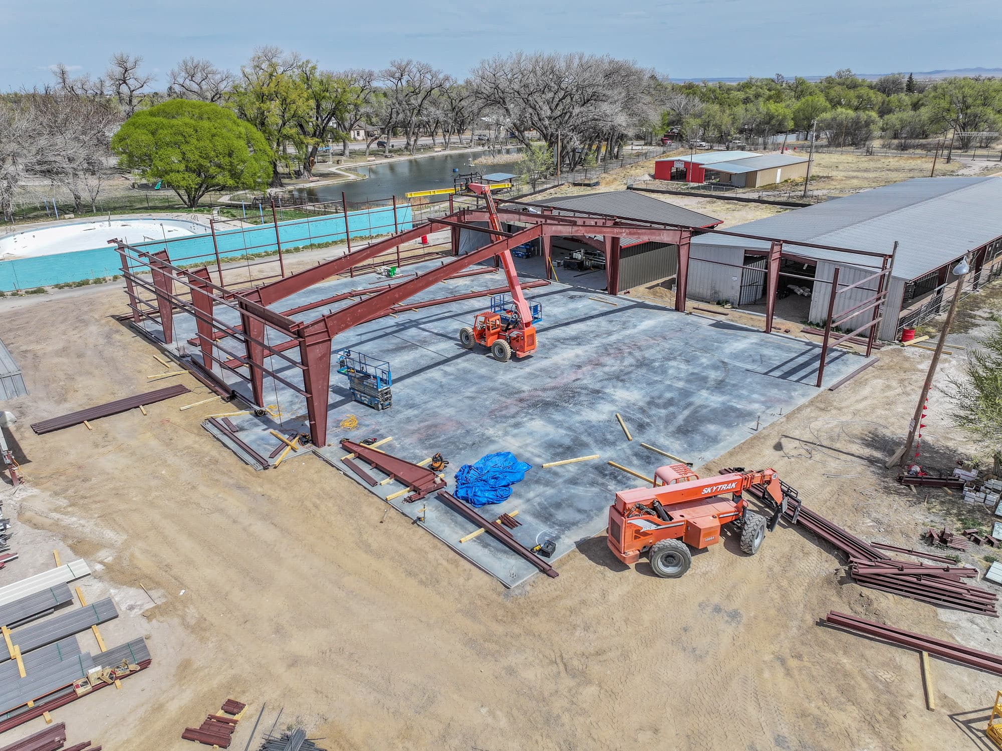 Aerial of steel framing going up on a school site